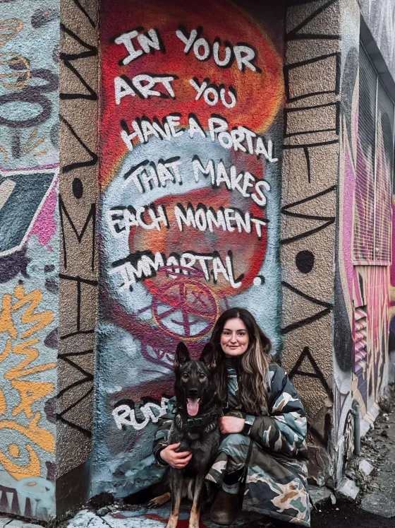 Colourful handmade dog gear laid out on linen